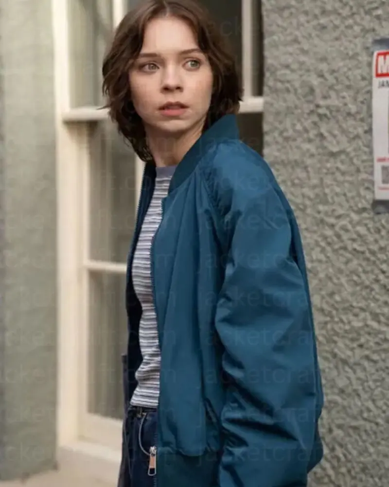 emma-blue-jacket.webp